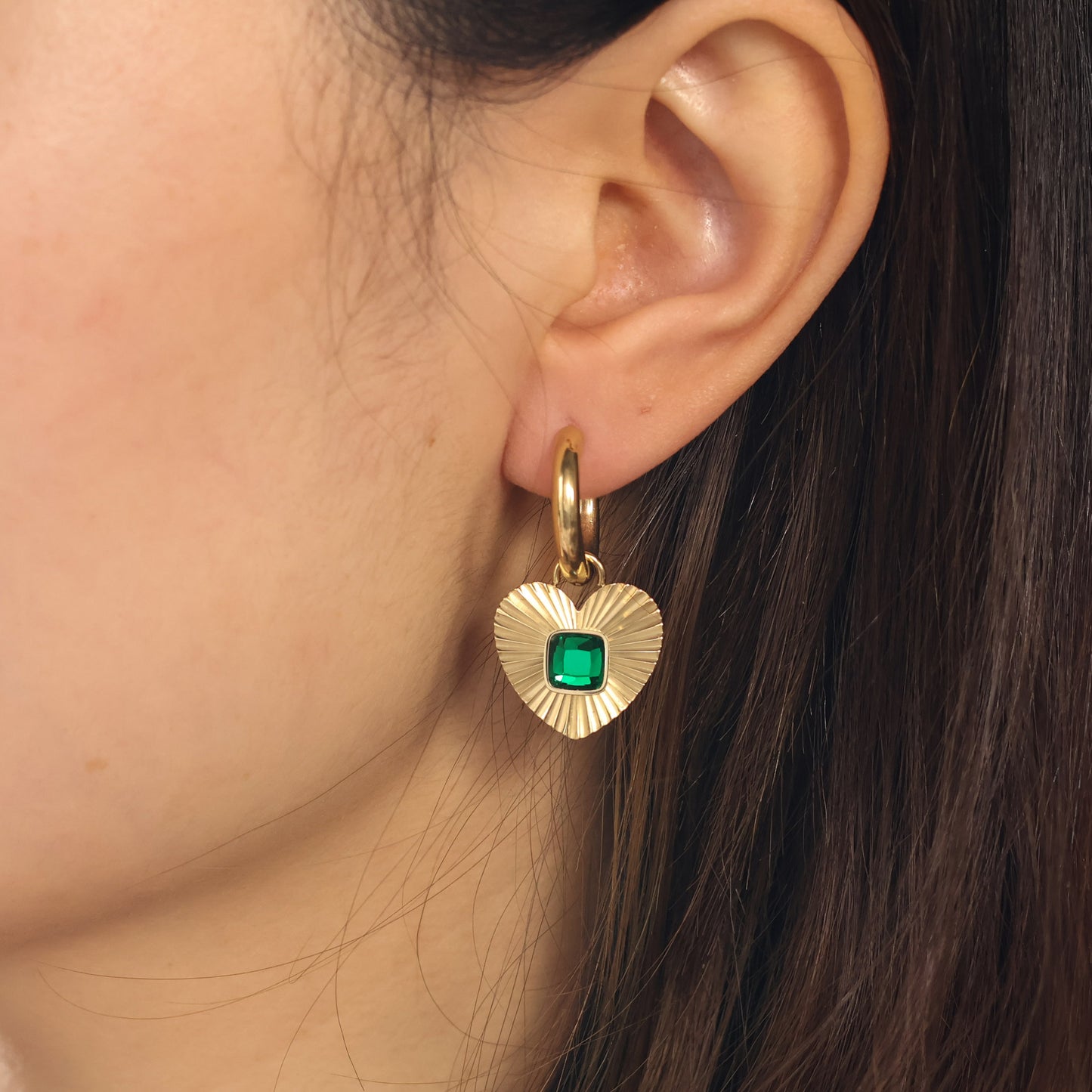 Alice gold plated huggies earring with emerald zircon