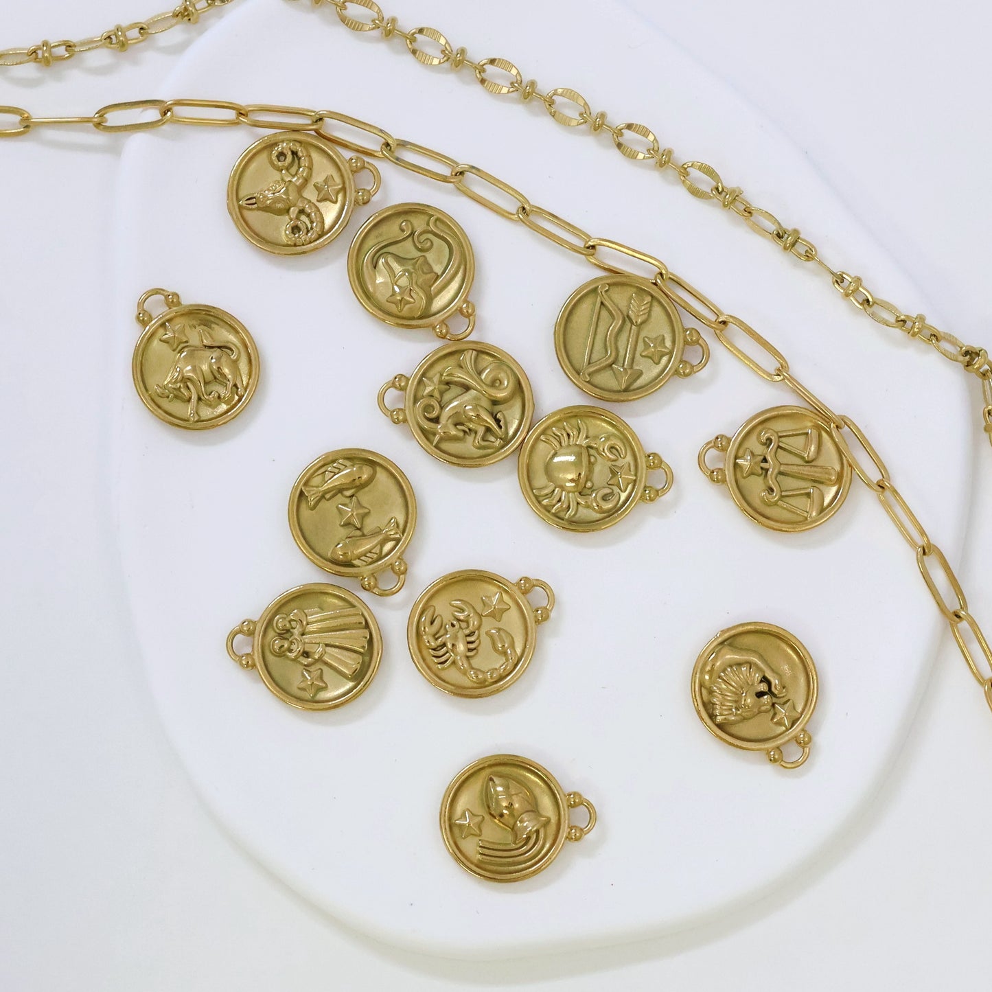 Gold plated zodiac sign charm