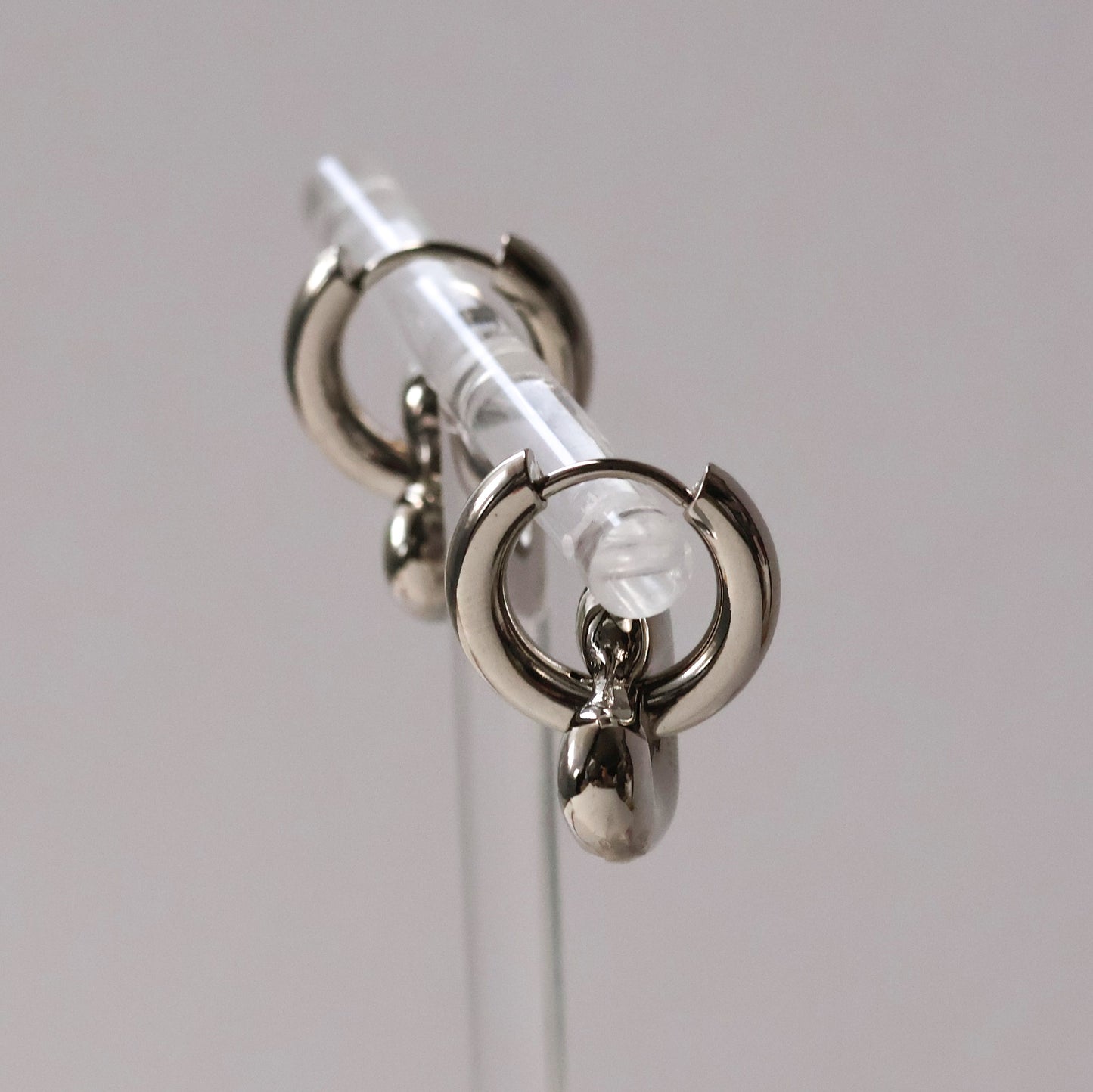 Carys gold plated heart huggie hoop earrings