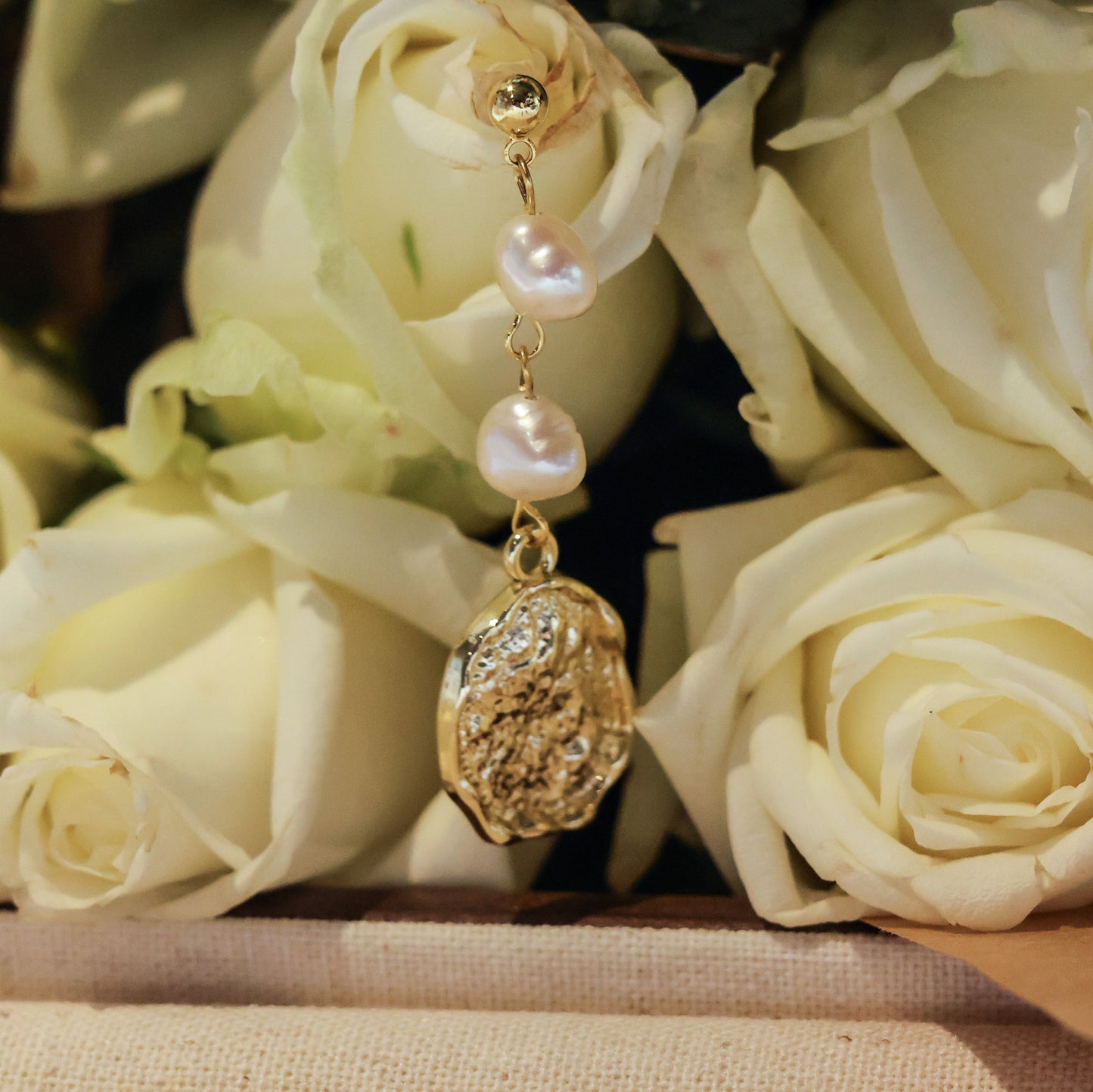 Victoria asymmetrical pearl earring