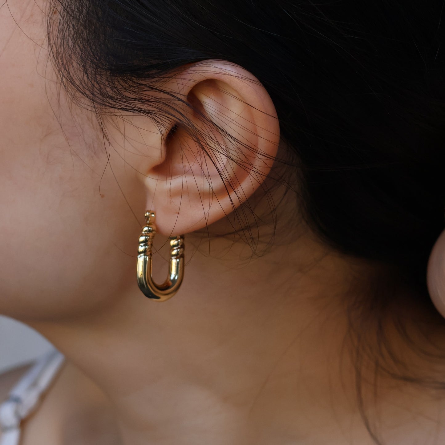 Zoe gold plated huggie earrings