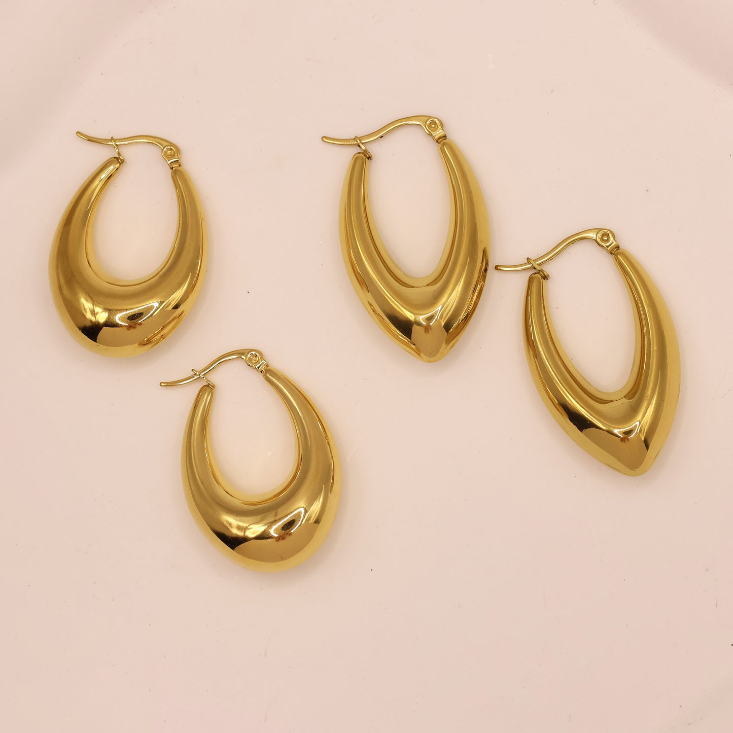 Statement gold plated huggies earrings