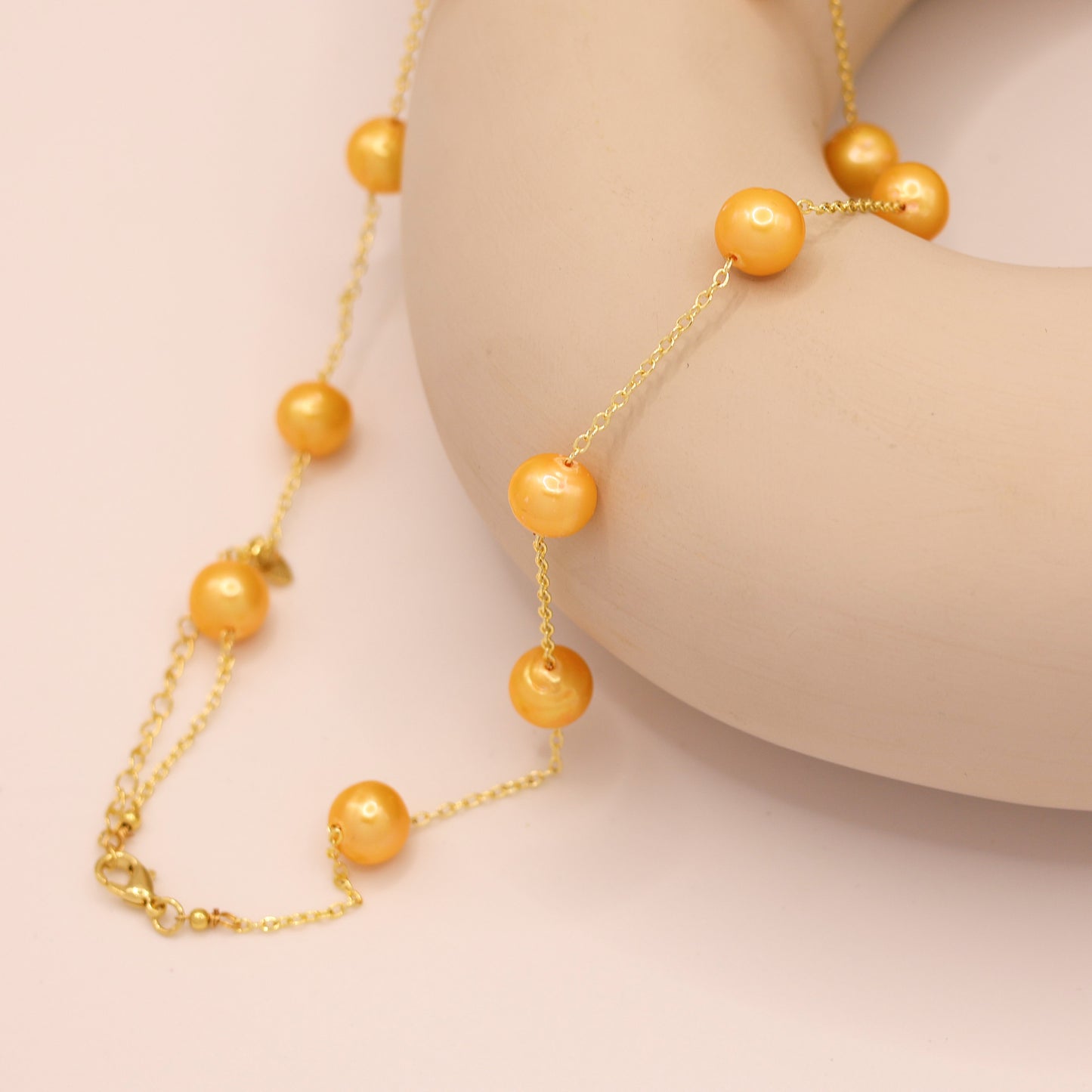 Gamboge freshwater pearl necklace with gold plated curb chain