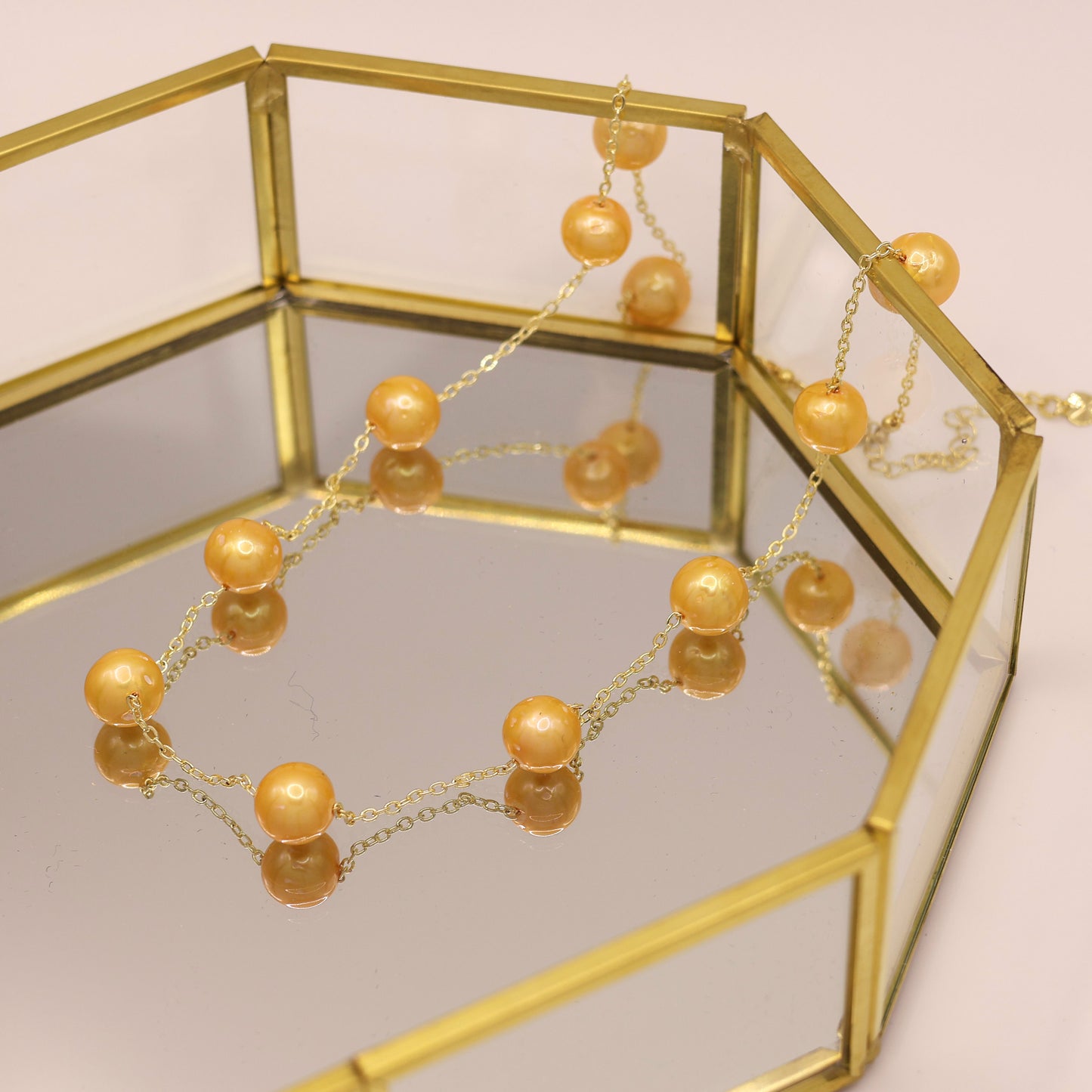 Gamboge freshwater pearl necklace with gold plated curb chain