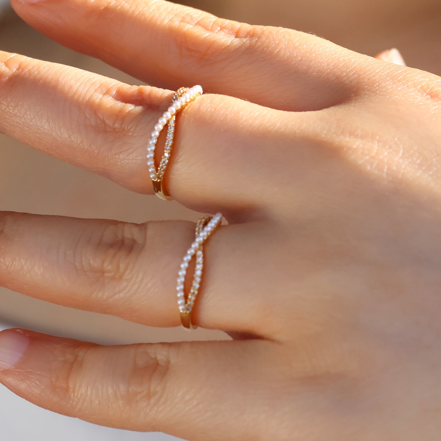 Infinity faux pearl ring