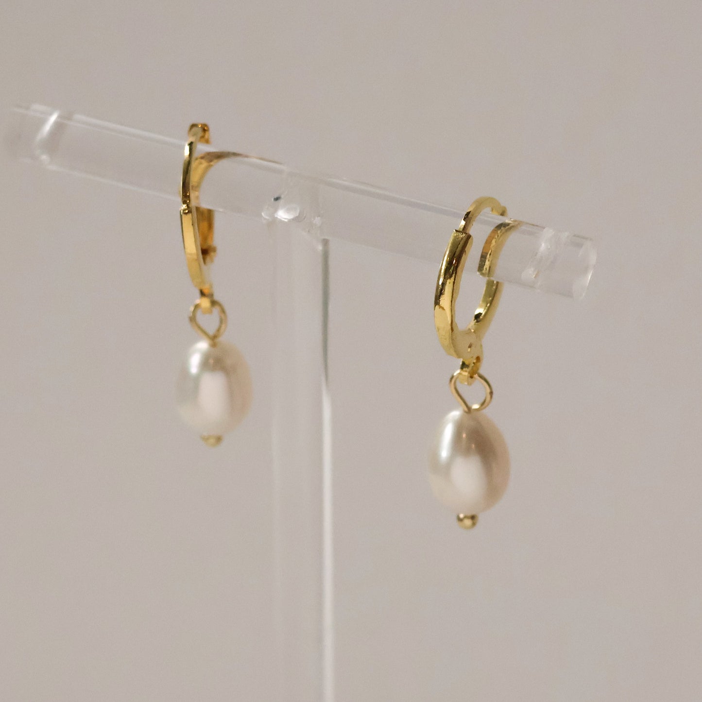 Suzie pearl huggie earrings gold plated