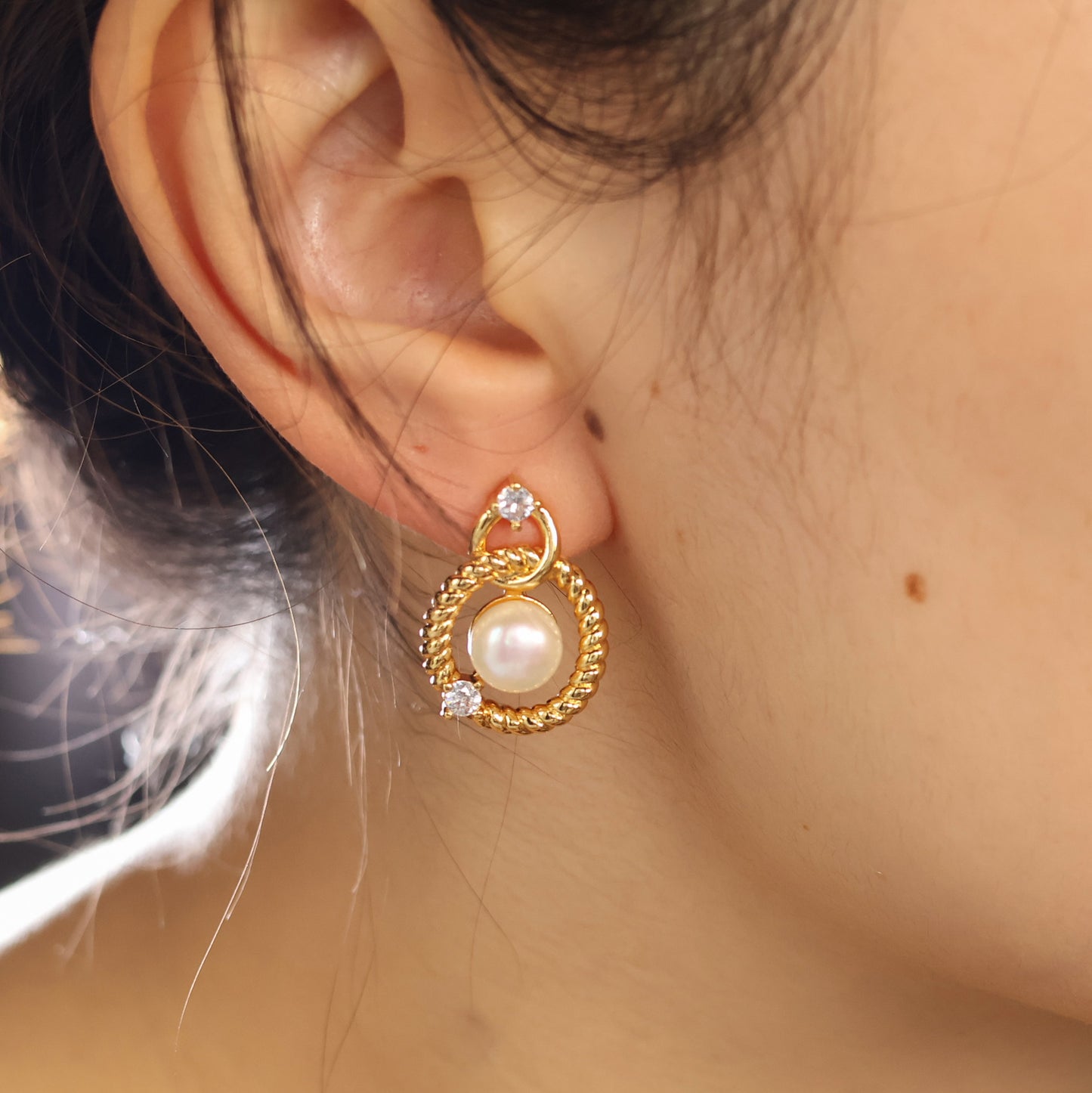 Infinity stud earrings