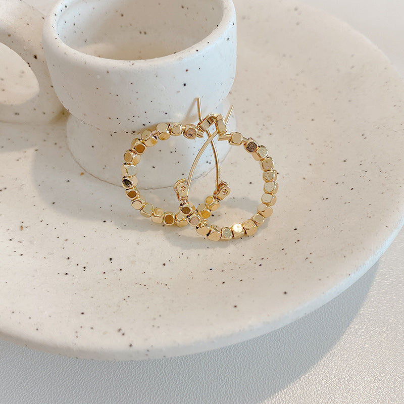 Beaded gold hoop earrings