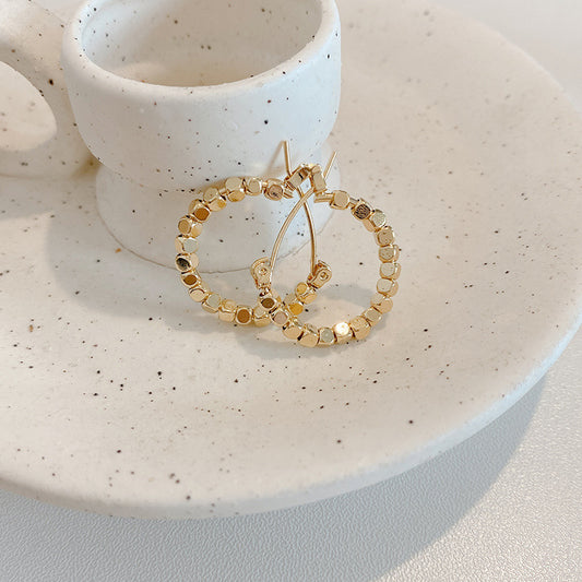 Beaded gold hoop earrings