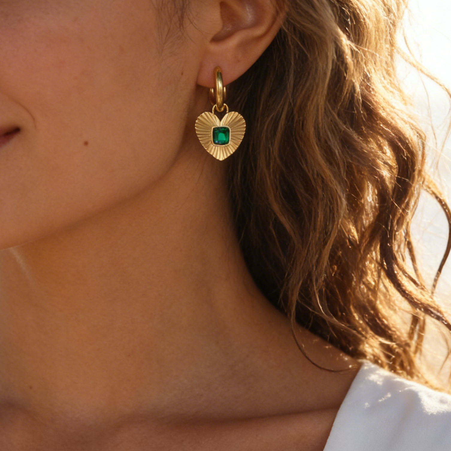 Alice gold plated huggies earring with emerald zircon
