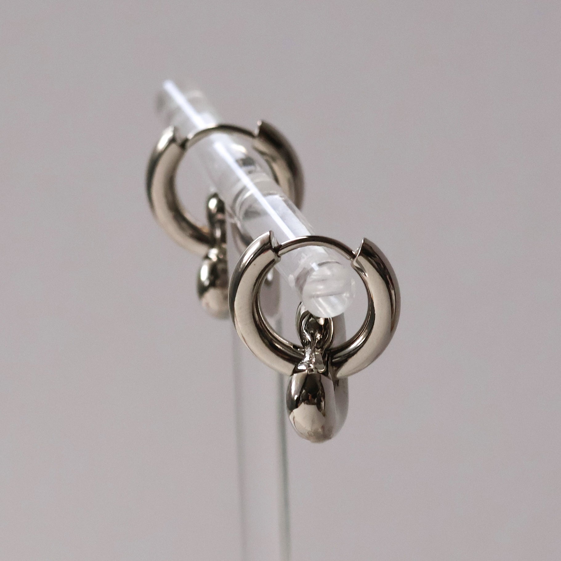 Carys gold plated heart huggie hoop earrings