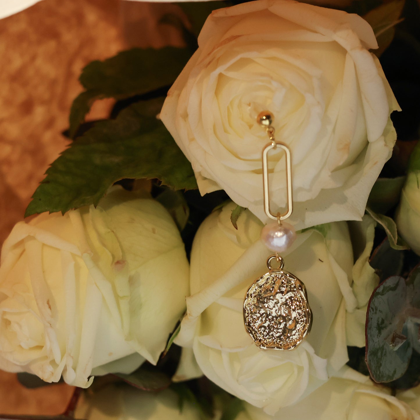 Victoria asymmetrical pearl earring