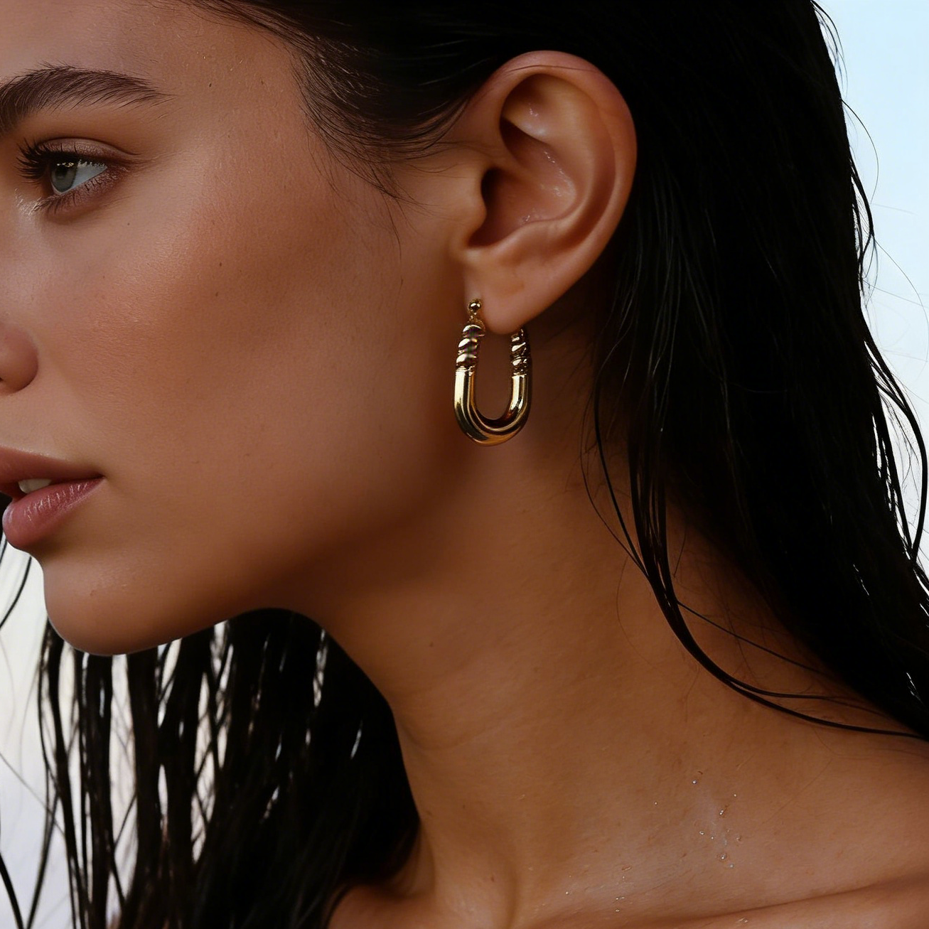 Zoe gold plated huggie earrings