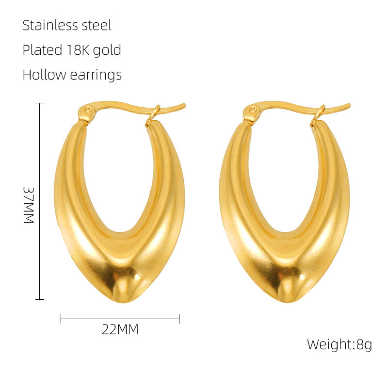 Lily Statement gold plated huggies earrings
