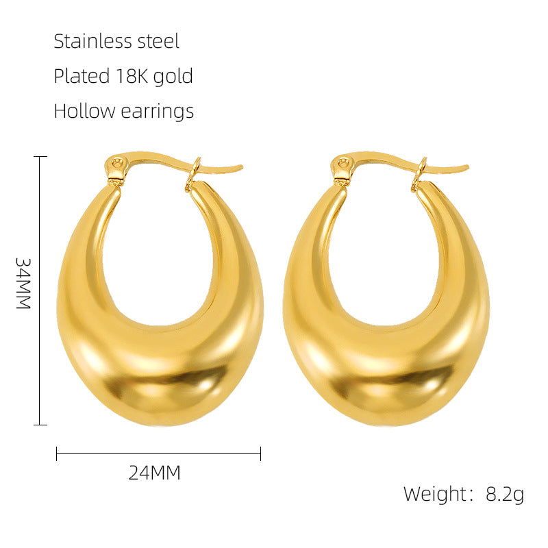 Lucy Statement gold plated huggies earrings
