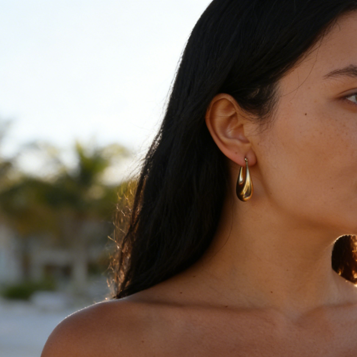 Lucy Statement gold plated huggies earrings