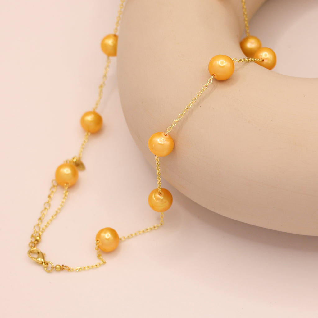 Gamboge freshwater pearl necklace with gold plated curb chain