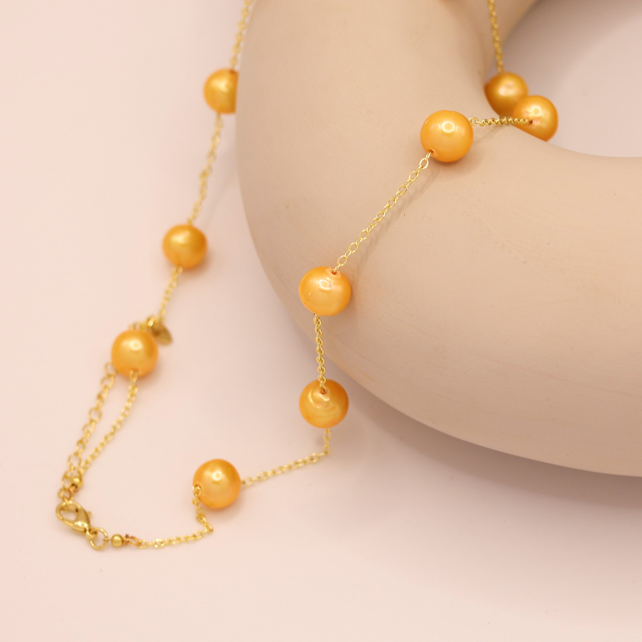 Gamboge freshwater pearl necklace with gold plated curb chain