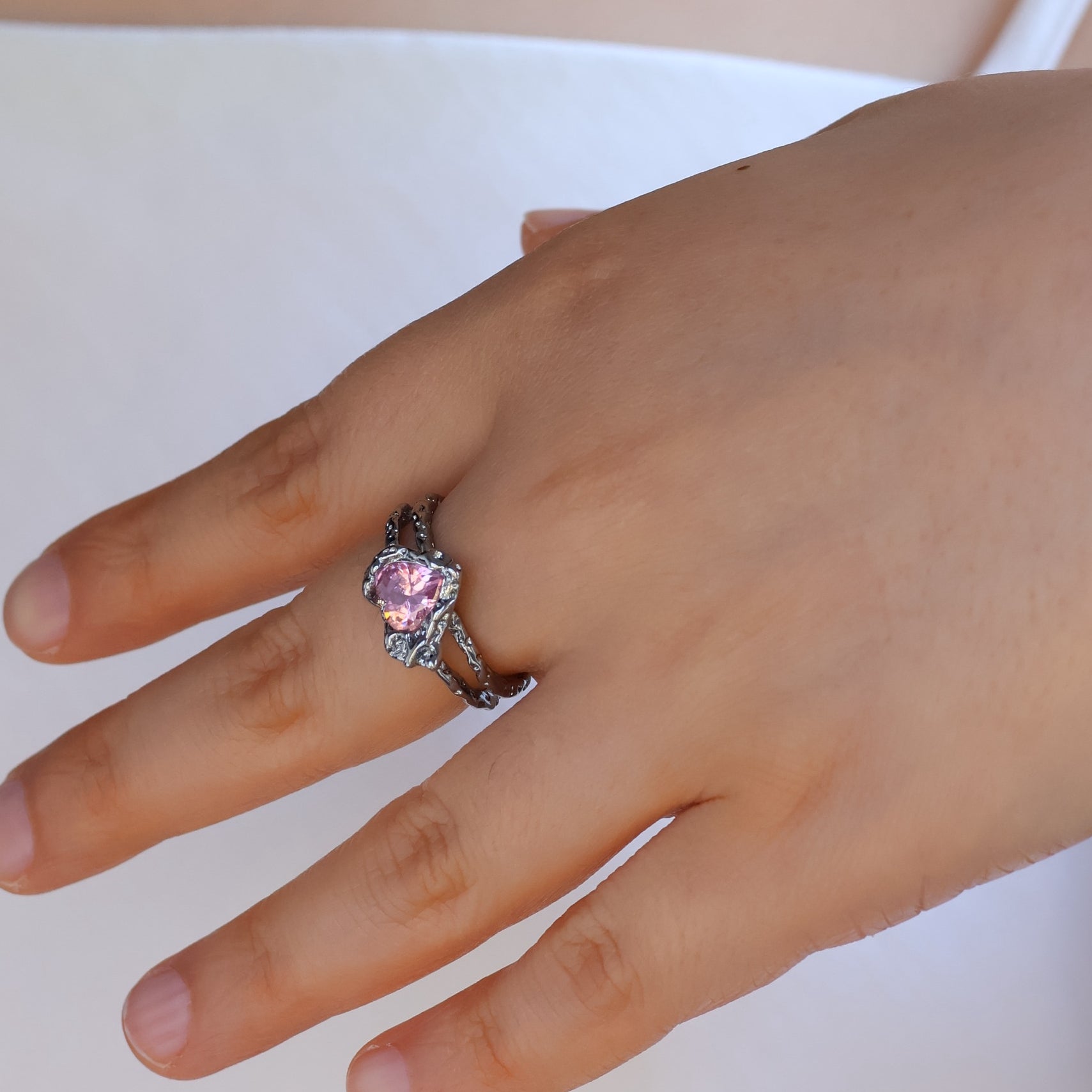 Gold plated open heart ring with pink cubic zirconia
