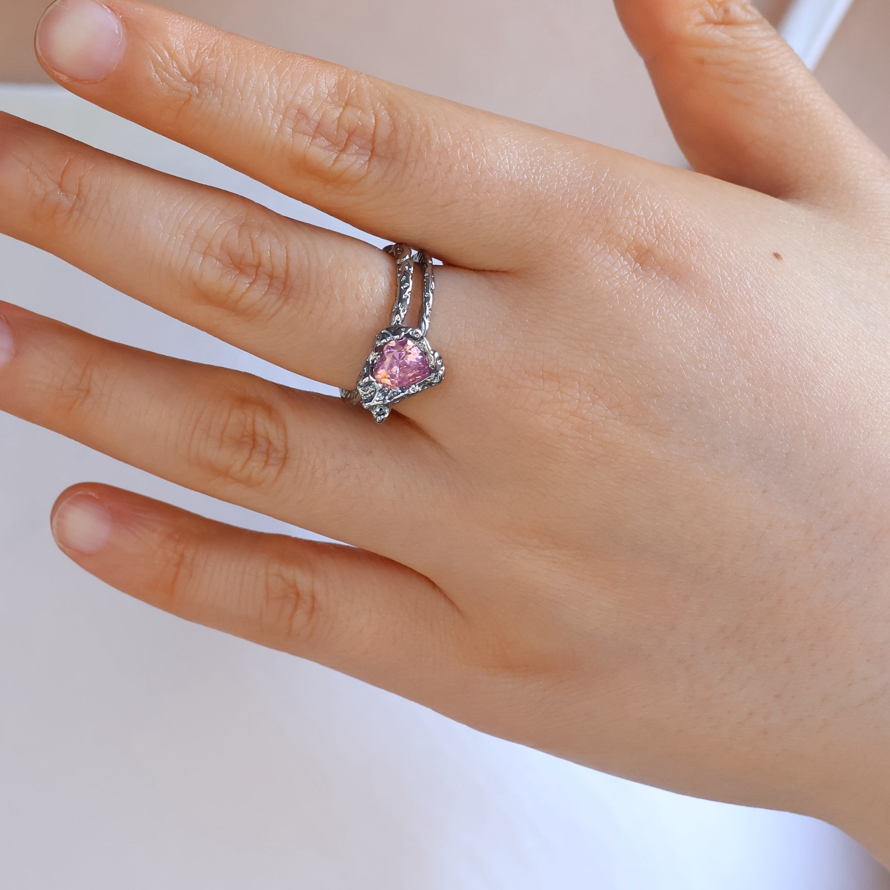 Gold plated open heart ring with pink cubic zirconia