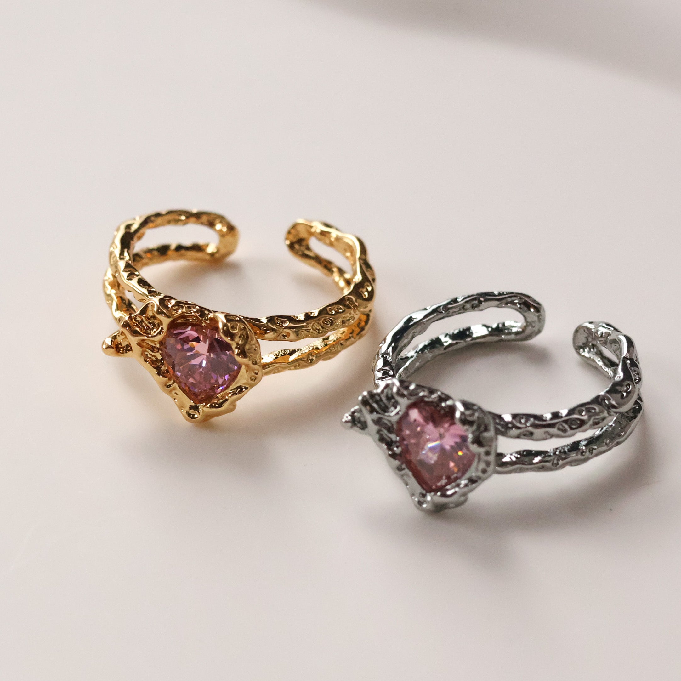 Gold plated open heart ring with pink cubic zirconia