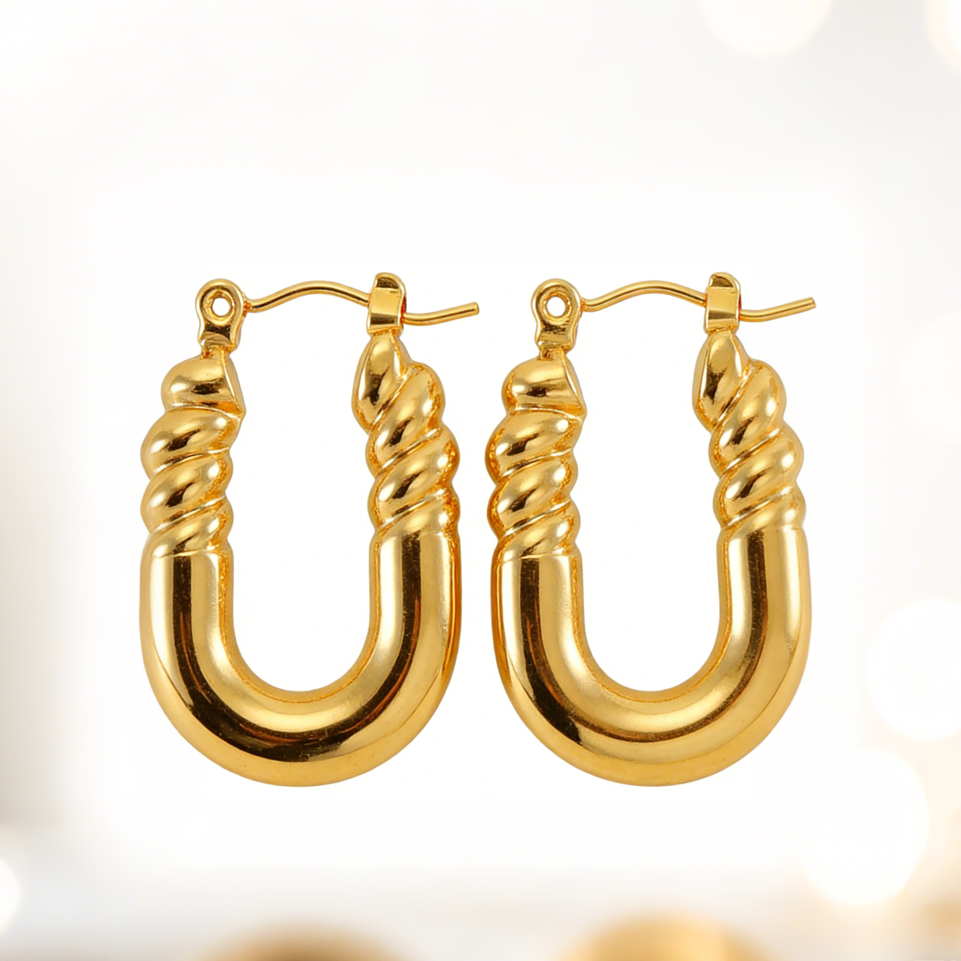 Zoe gold plated huggie earrings