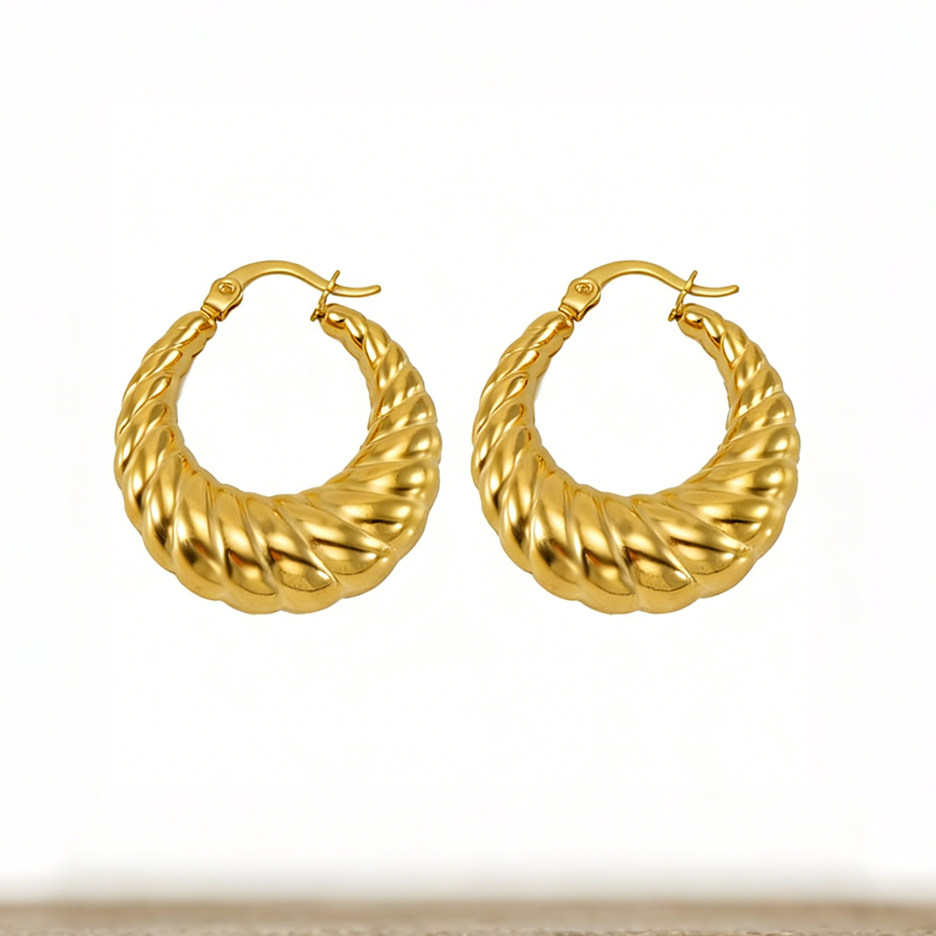 Jackie Gold plated huggies assorted