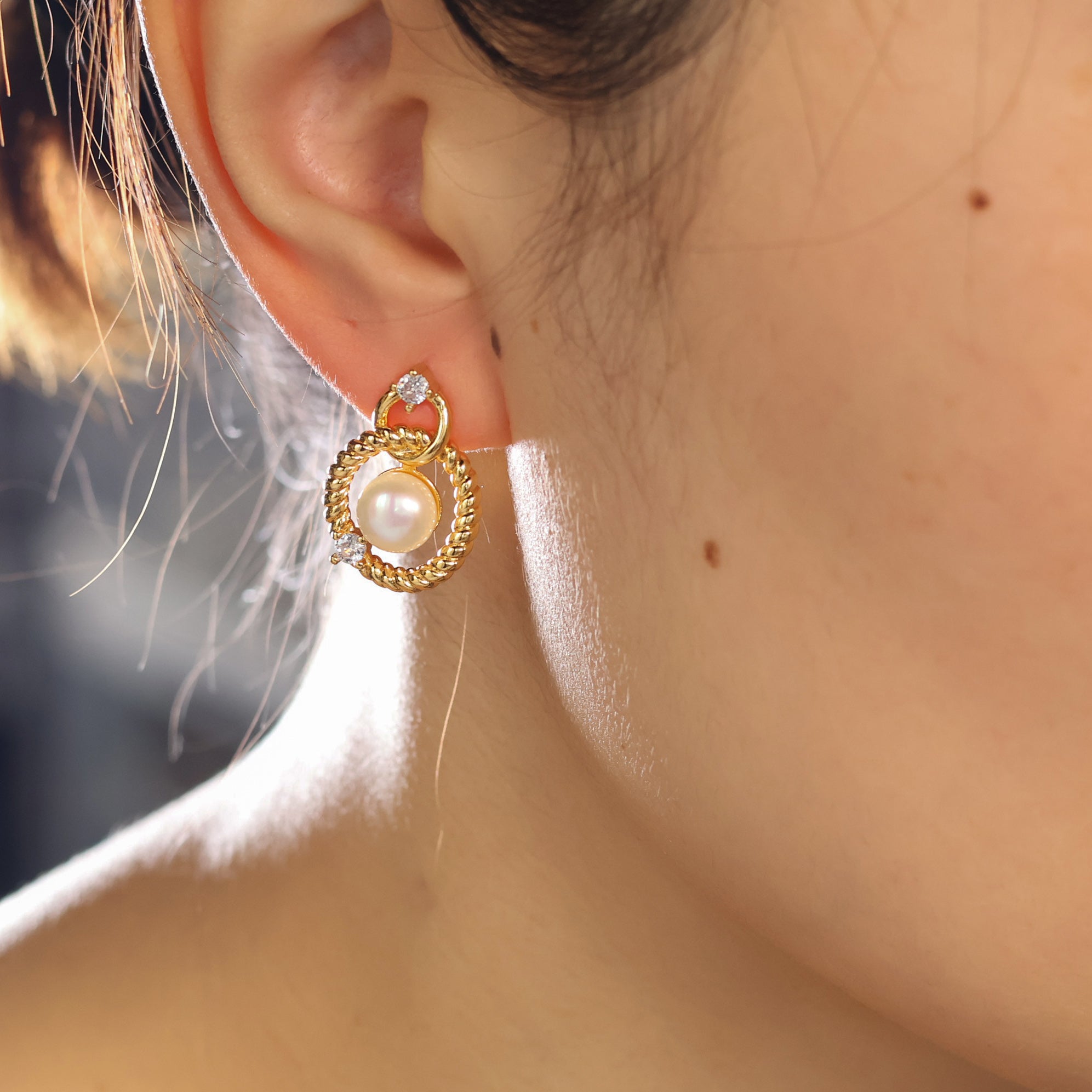 Infinity stud earrings